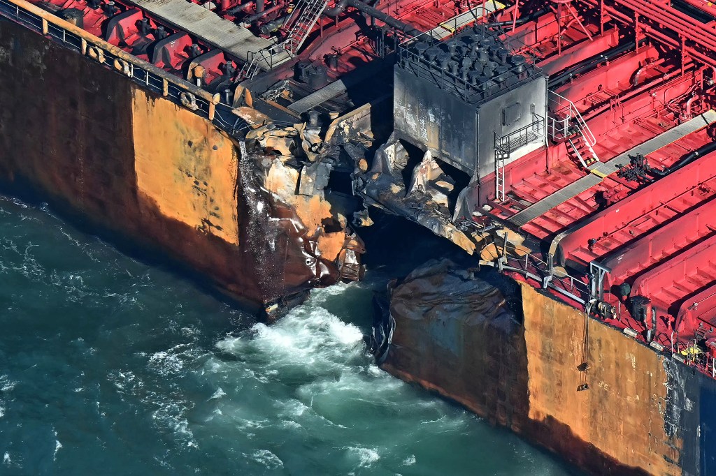 TOPSHOT - A damaged section of the hull of the MV Stena Immaculate is pictured, as the tanker lays at anchor in the North Sea, off the coast of Withernsea, east of England, on March 11, 2025, after it was hit by the MV Solong container vessel on March 10. There was no "suggestion of foul play" in a North Sea crash in which the container ship MV Solong slammed into a US military chartered tanker, the MV Stena Immaculate, UK Prime Minister Keir Starmer's spokesperson said Tuesday. (Photo by Paul ELLIS / AFP) (Photo by PAUL ELLIS/AFP via Getty Images)