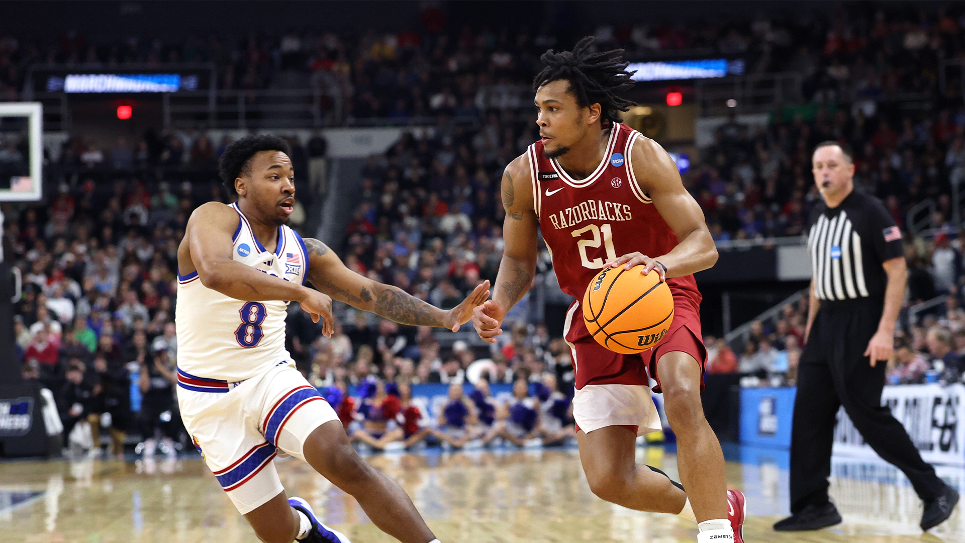 The evening session of the NCAA tournament produced a few more close games and a pair of double digit upsets as Drake and Arkansas move on.