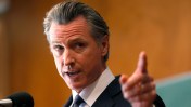 Gov. Gavin Newsom has given prepaid phones programmed with his number to top CEOs. Here’s why he’s making this unconventional move.